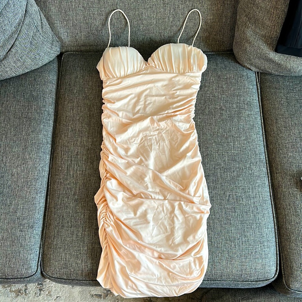Light peach/cream stretchy dress. Size LG. Spaghetti strap, past knee length